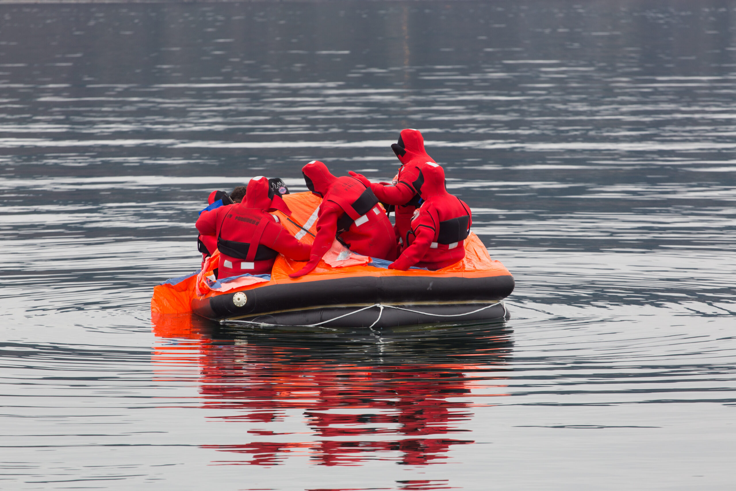 Sailors on a lifeboat