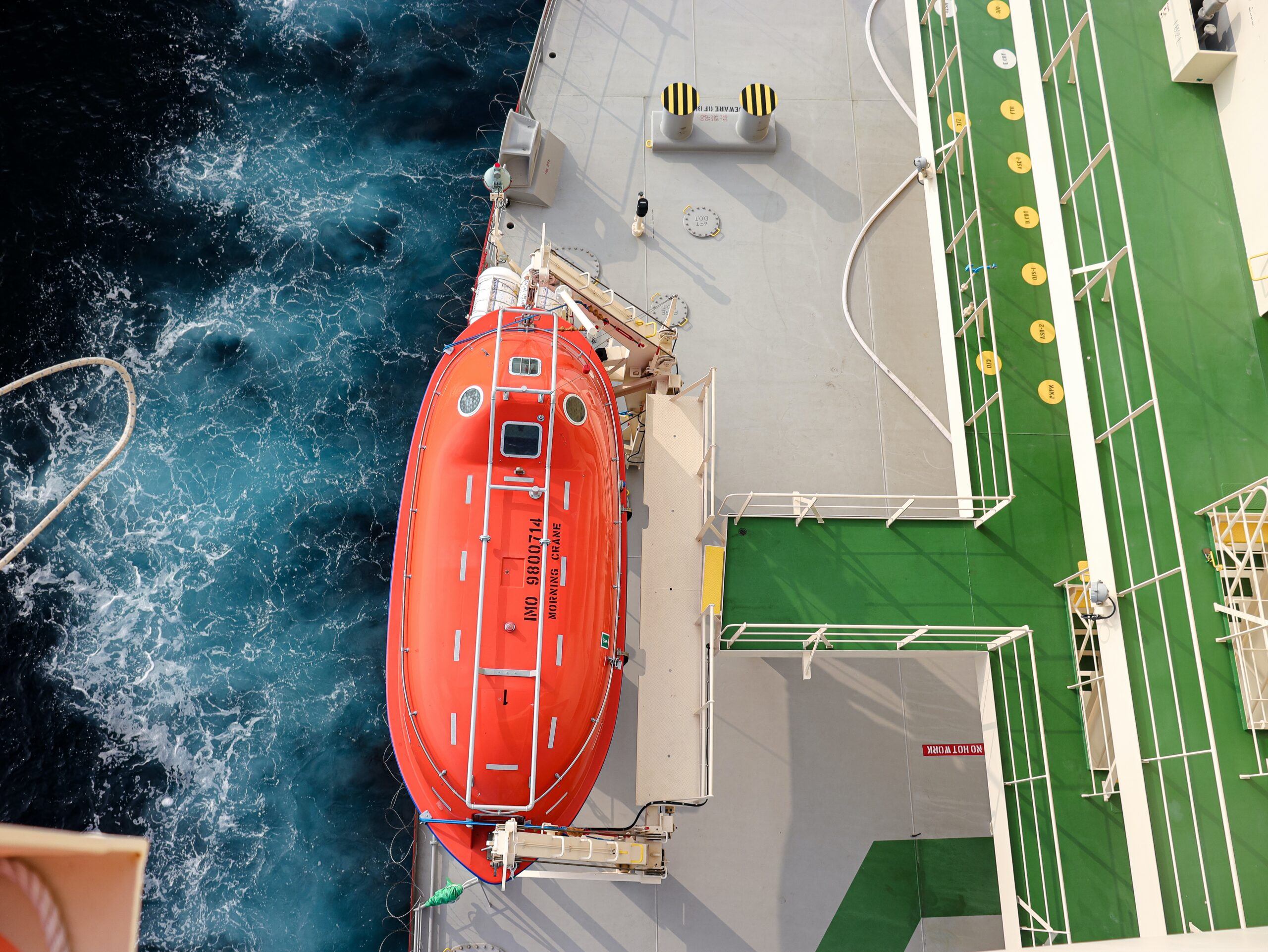 The totally enclosed lifeboat of an oil tanker, lifeboat deck and muster station. Top view.